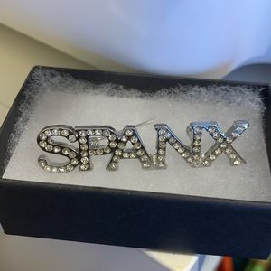 “Spanx” pin